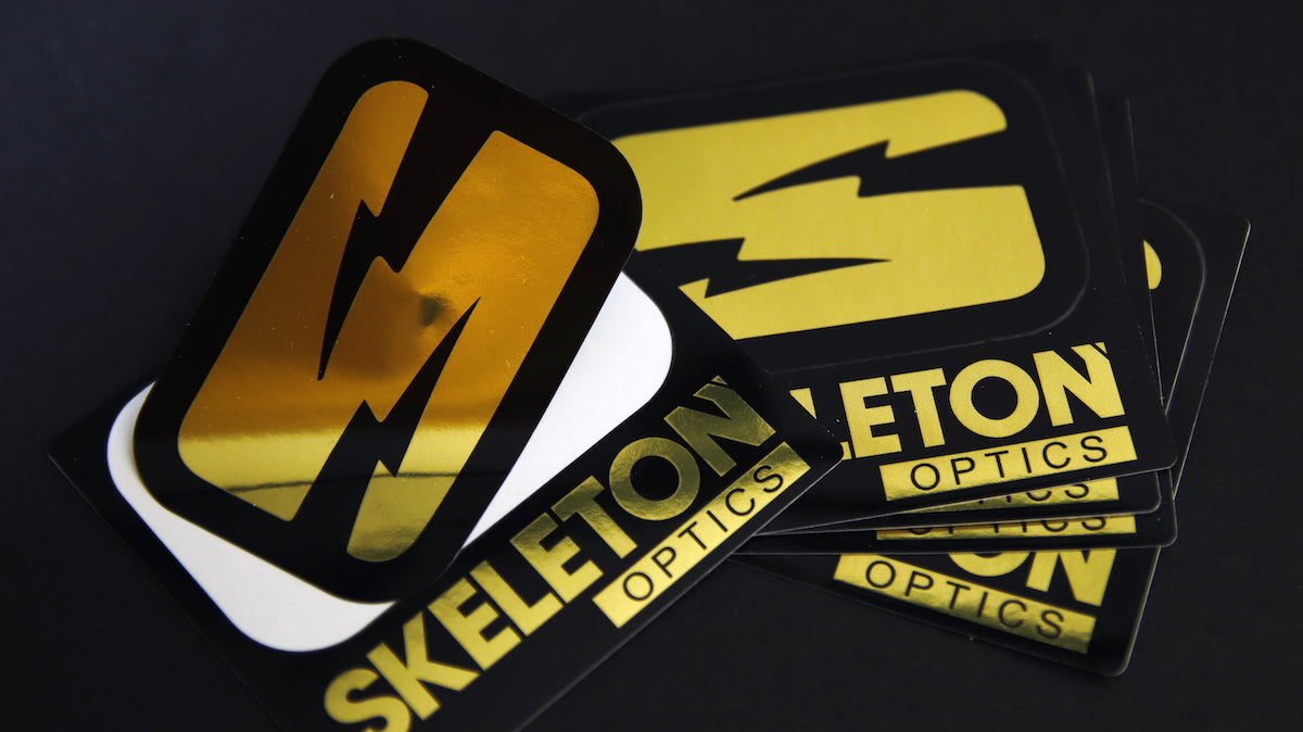 Skeleton optics mirror gold kiss cut vinyl sticker