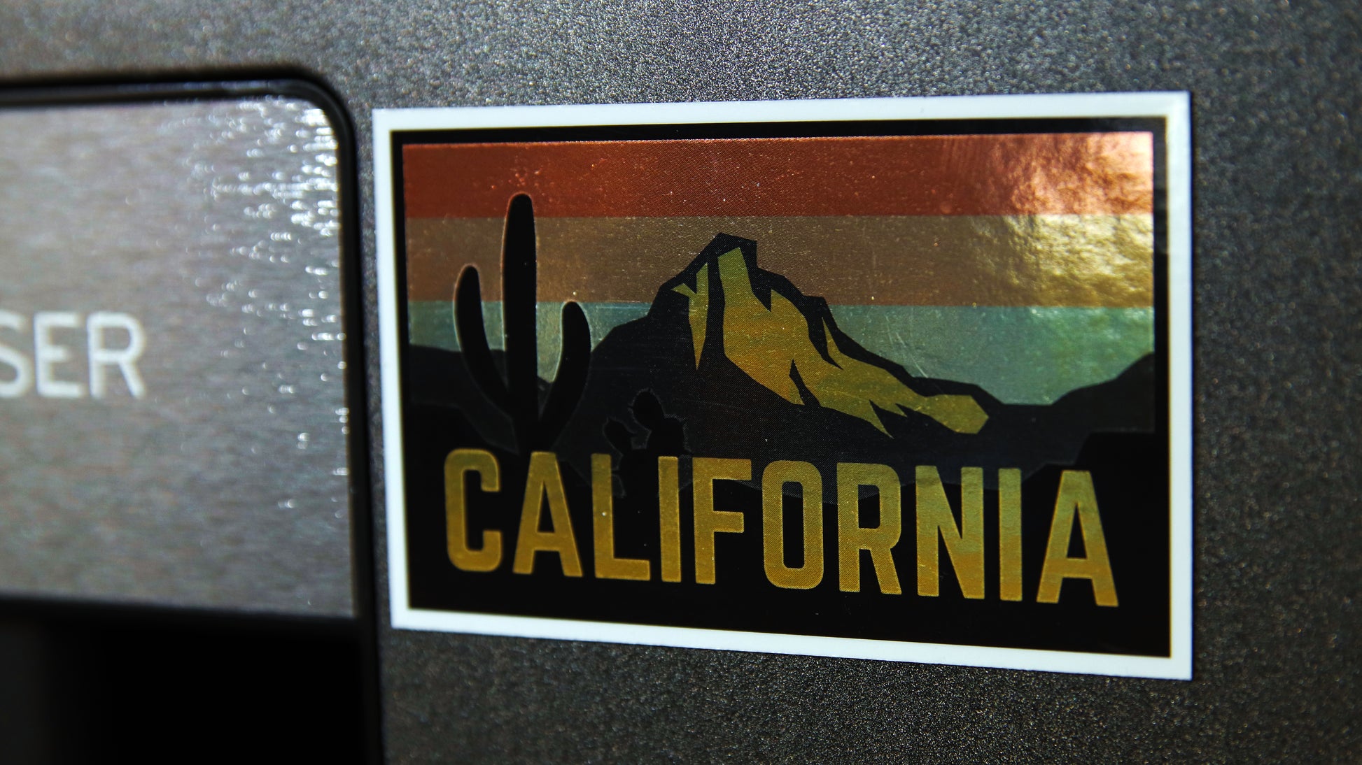 California graphic landscape on a gold rectangle magnet