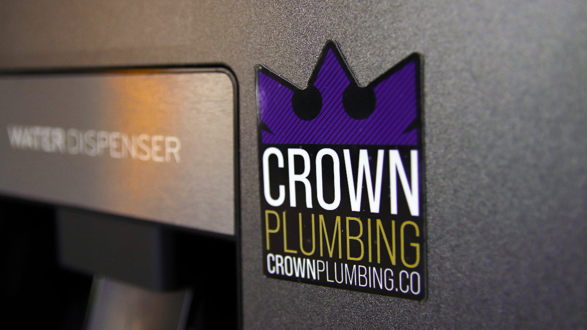 Die cut magnet with crown plumbing business card logo