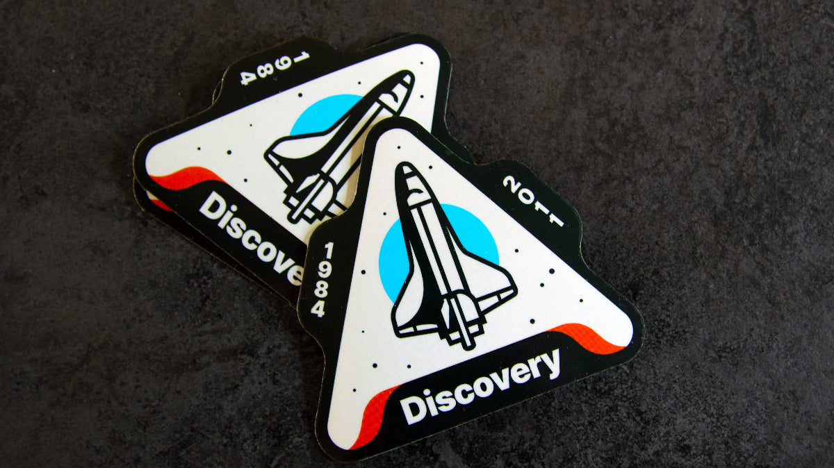 Die cut magnets with discovery rocket logo