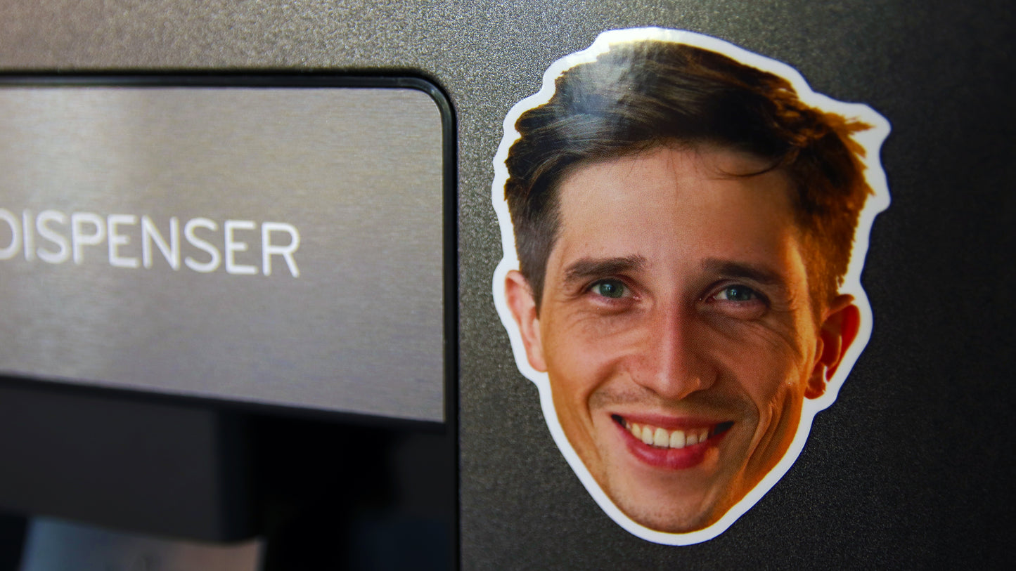 Die cut face magnet with happy guy printed on white magnet