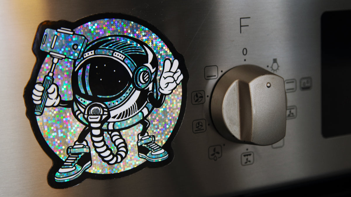 Die-cut glitter magnet with Spaceman design