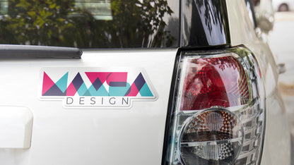 Die cut car magnet printed on white vinyl with maxsa design logo applied to a silver car