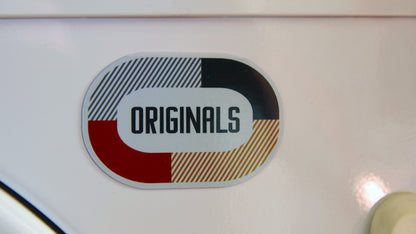 Oval magnet printed on white material with Originals logo design