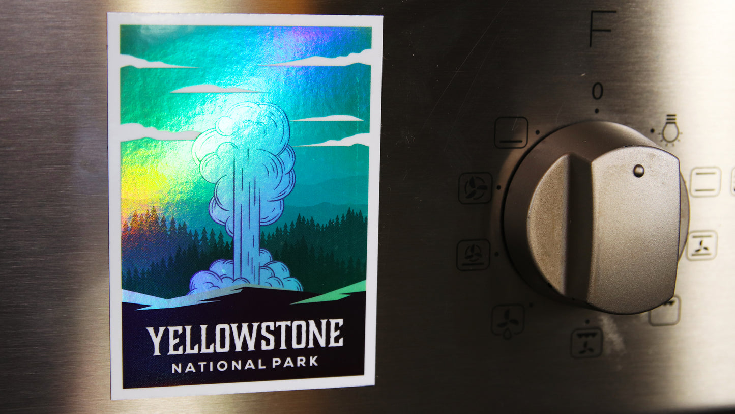 Rectangle shaped custom printed magnet with a Yellowstone National Park design attached to a silver cooker