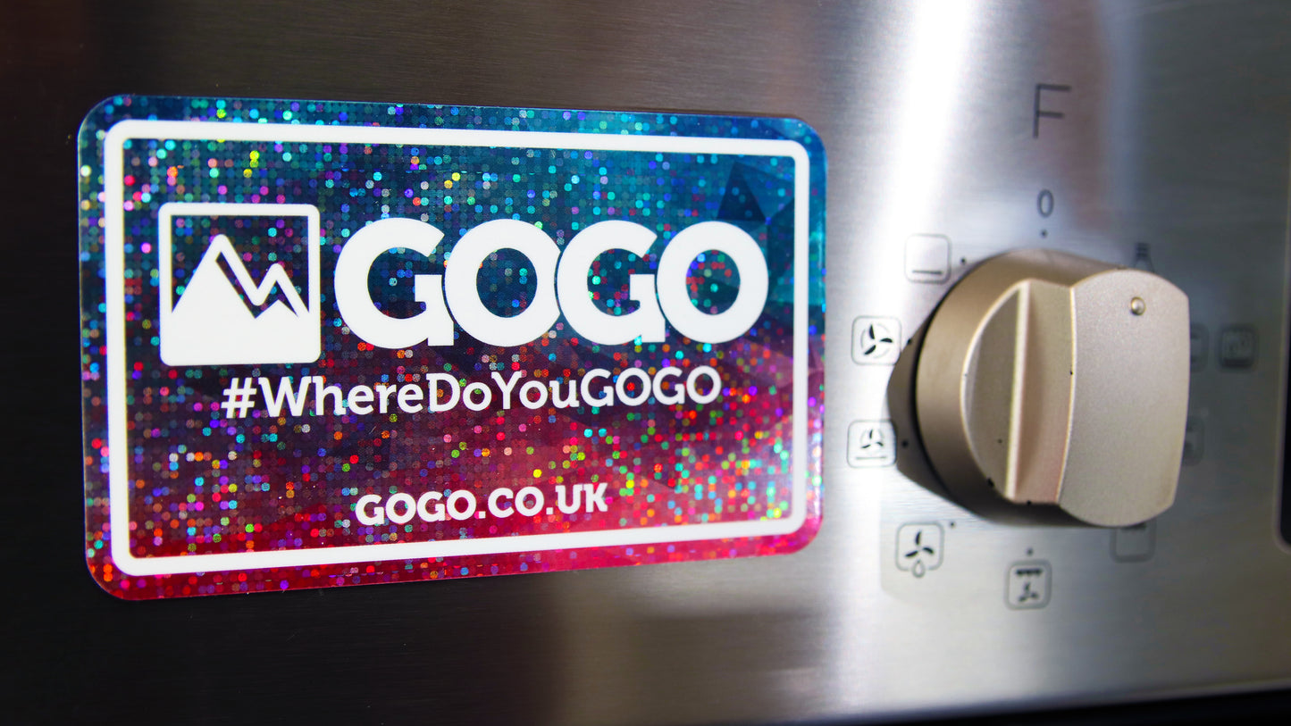 Glittery rounded-corner magnet custom printed with a full-colour design stuck to an oven