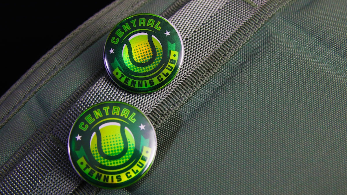 Central tennis club logo printed on a holographic 32mm (1.25-inch) button badge