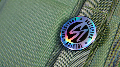 Custom holographic button badge printed with 71 skatepark logo on a 37mm (1.5-inch) sized badge