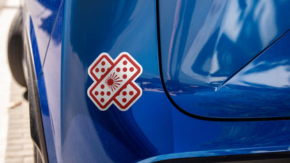 Japan Rising Sun bandage JDM car sticker stuck to a blue car