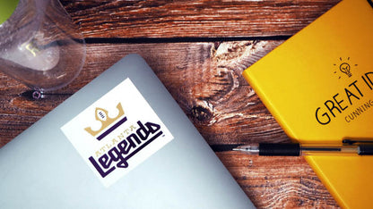 Mirror gold label rectangular with legends logo applied to a laptop