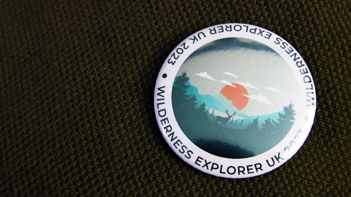 Single large 58mm (2.25 inch) Wilderness Explorer promotional button badge