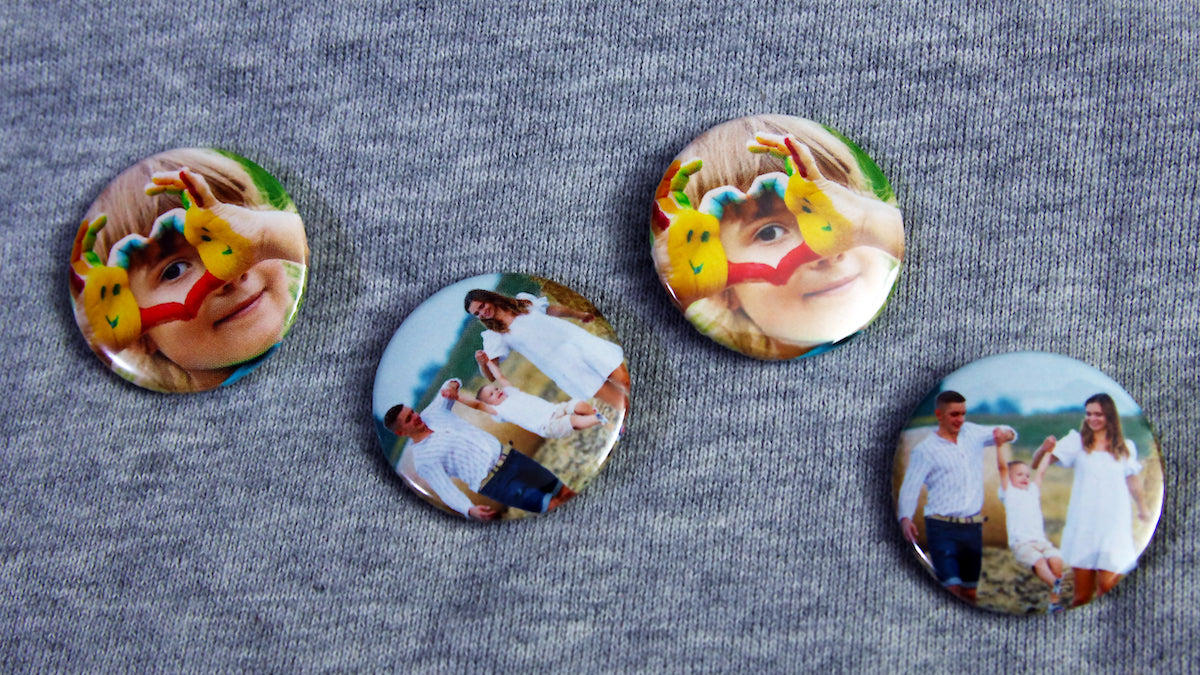 Various button badges printed with photos of a happy family 32mm (1.25-inches) size