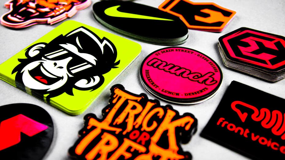 Stacks of fluorescent stickers on a table