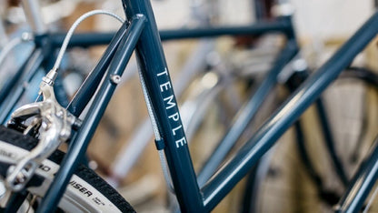 Bicycle sticker printed onto clear vinyl with Temple bikes logo applied to a bike frame