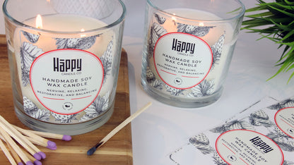 Clear eco-friendly product labels with flower design applied to a handmade soy wax candle