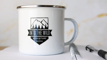 Clear vinyl label with adventure design printed onto clear vinyl applied to a white mug