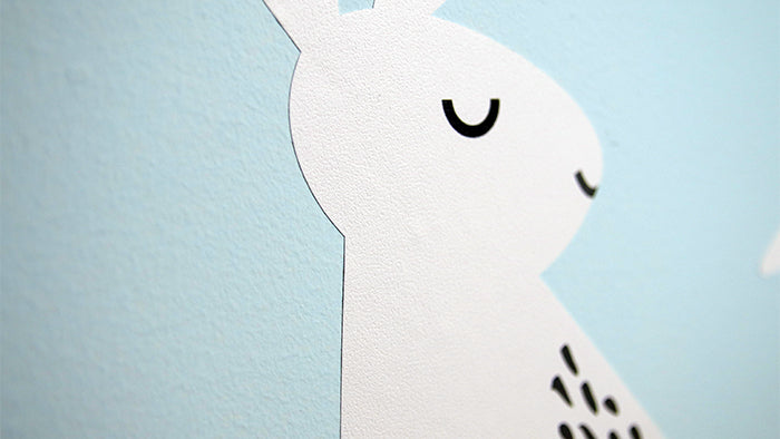 Close up of a white rabbit child's nursery wall sample