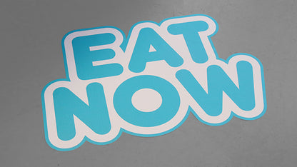 Die cut floor sticker with eat now logo applied