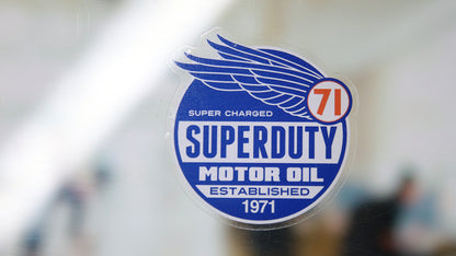 Die cut front adhesive sticker with superduty logo applied to a window