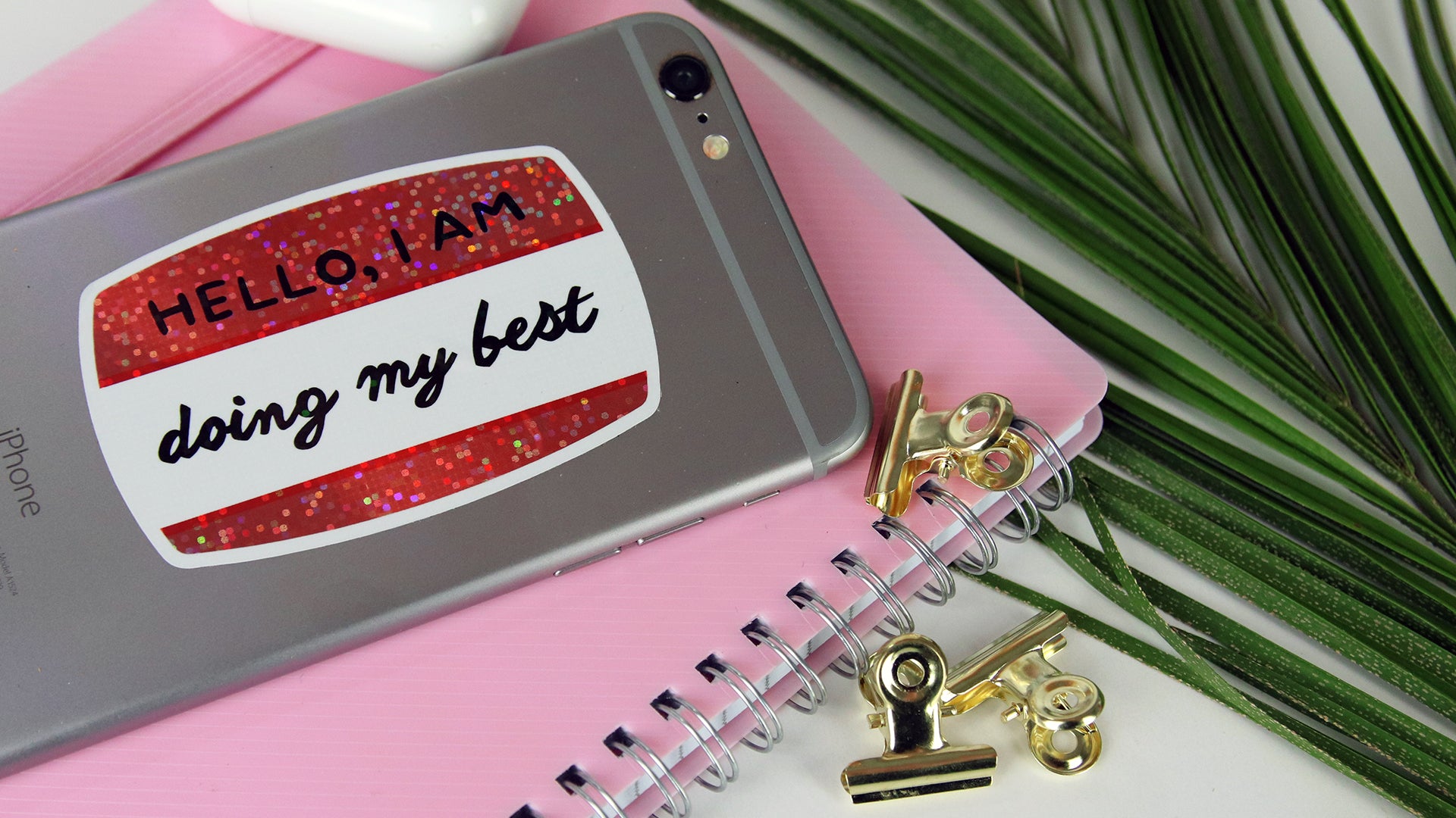 Die cut glitter stickers with name tag design applied to iPhone