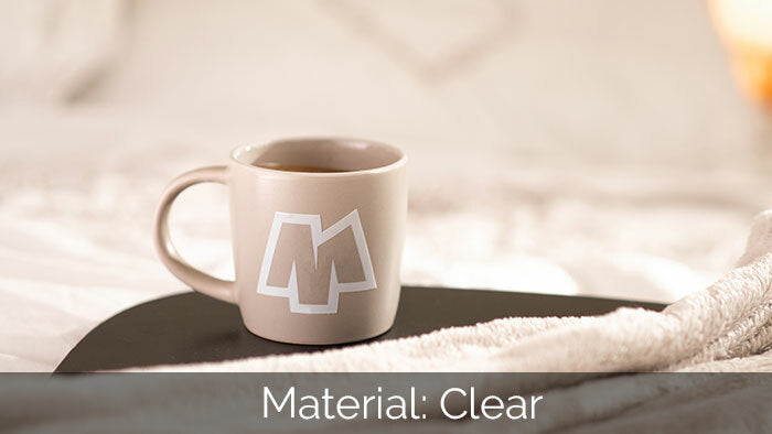 Die cut mug sticker printed onto clear vinyl applied to a beige mug on a tray