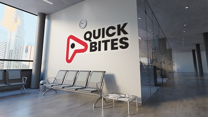 Die cut wall samples with quick bites design applied to an office wall
