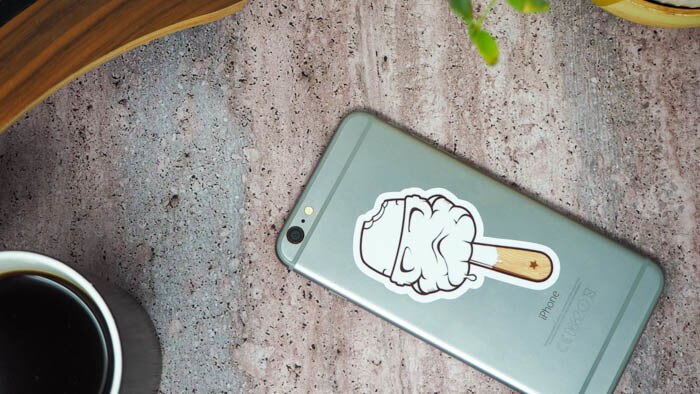 Die cut white vinyl sticker with stormtrooper lolly design applied to a silver phone