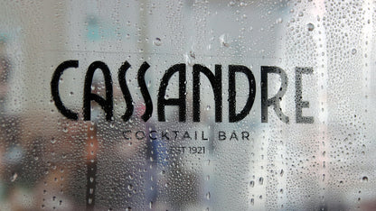 Eco-friendly front adhesive rectangle sample with cassandre cocktail bar logo applied to a window