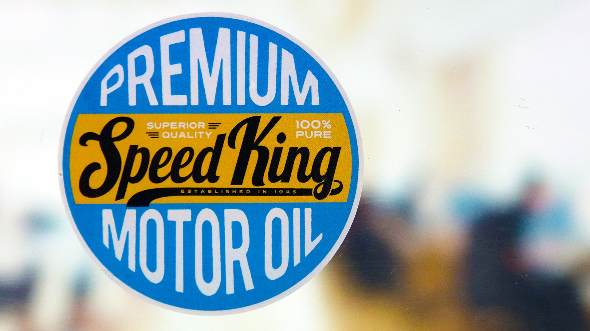 Front adhesive window label with speed king logo applied to a window