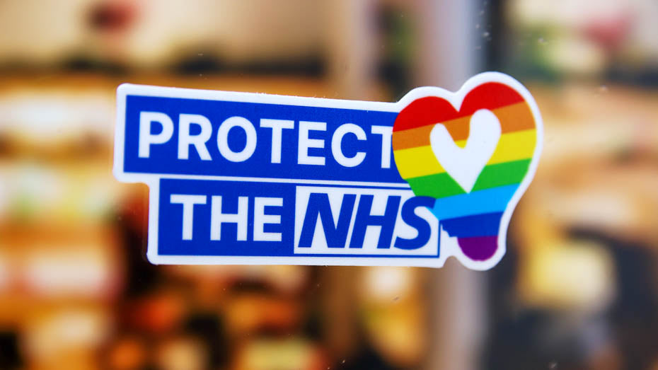 Protect the NHS white label stuck to a window