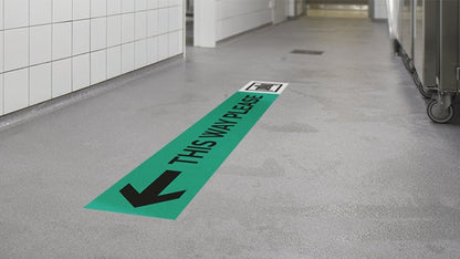Rectangular floor sticker for crowd direction applied