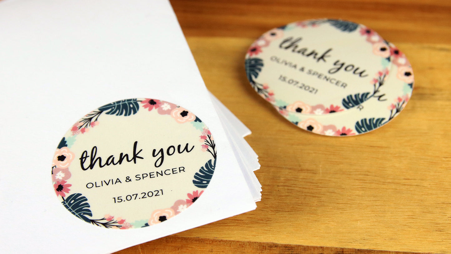 Round eco friendly sample with a wedding thank you applied to white envelopes
