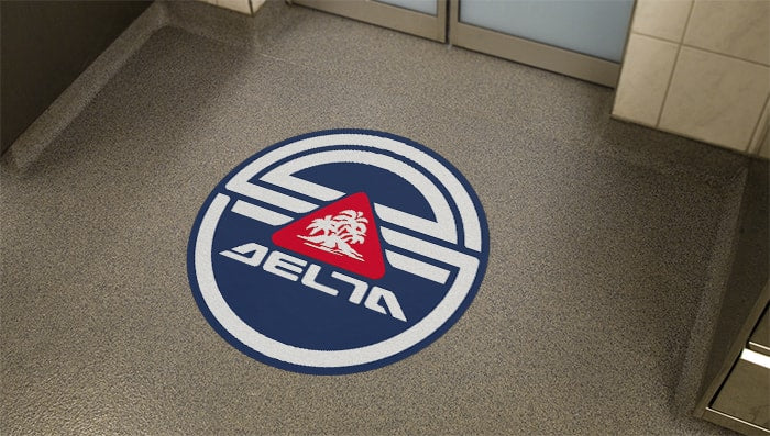 Round floor sticker with delta logo applied