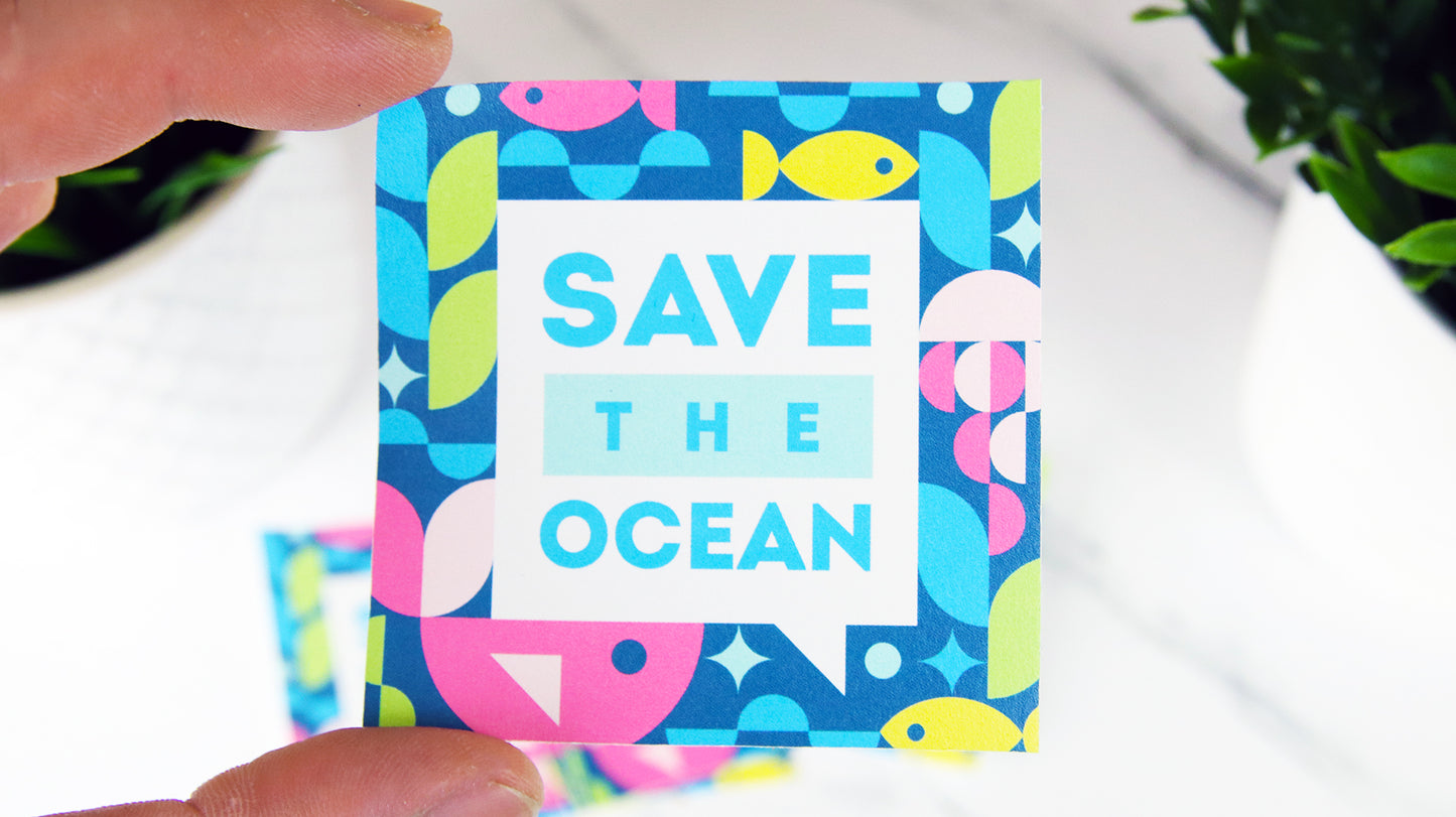 Square biodegradable paper sticker sample with save the ocean design hand held