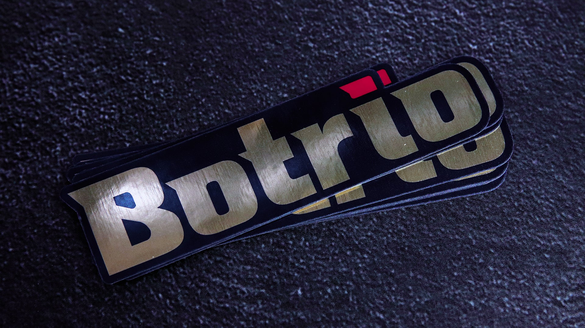 Stack of die cut eco-friendly gold sticker with borito logo