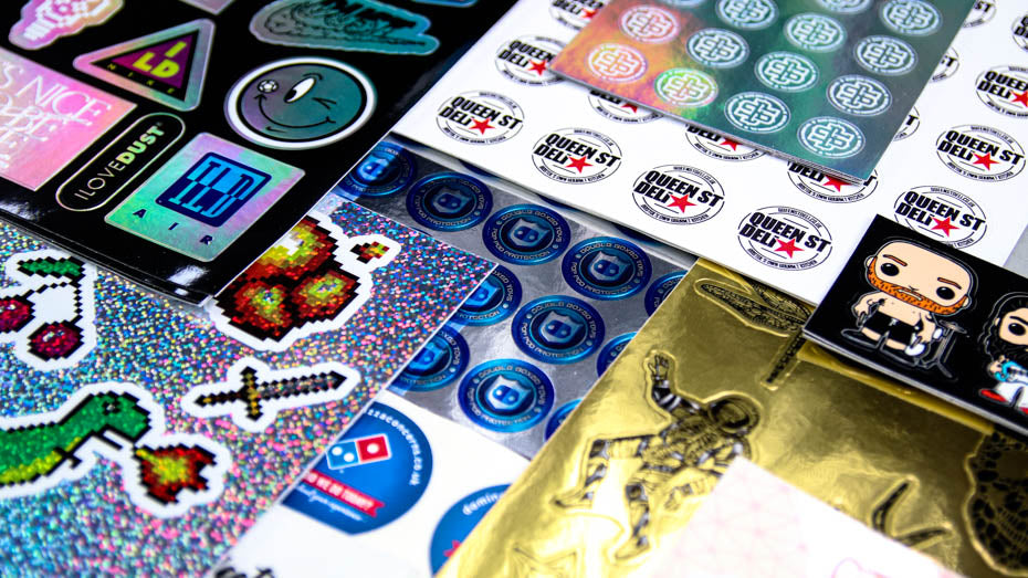 Stacks of various sticker sheets overlapping each other