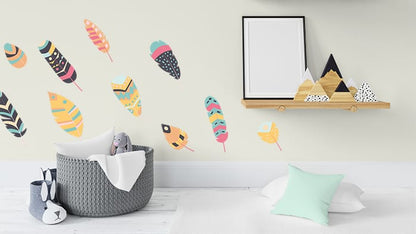 Wall stickers with feather designs applied to a nursery